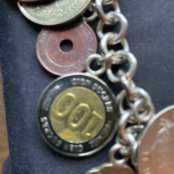 925 sterling silver coin charm bracelet 11 of them on here milor bracelet